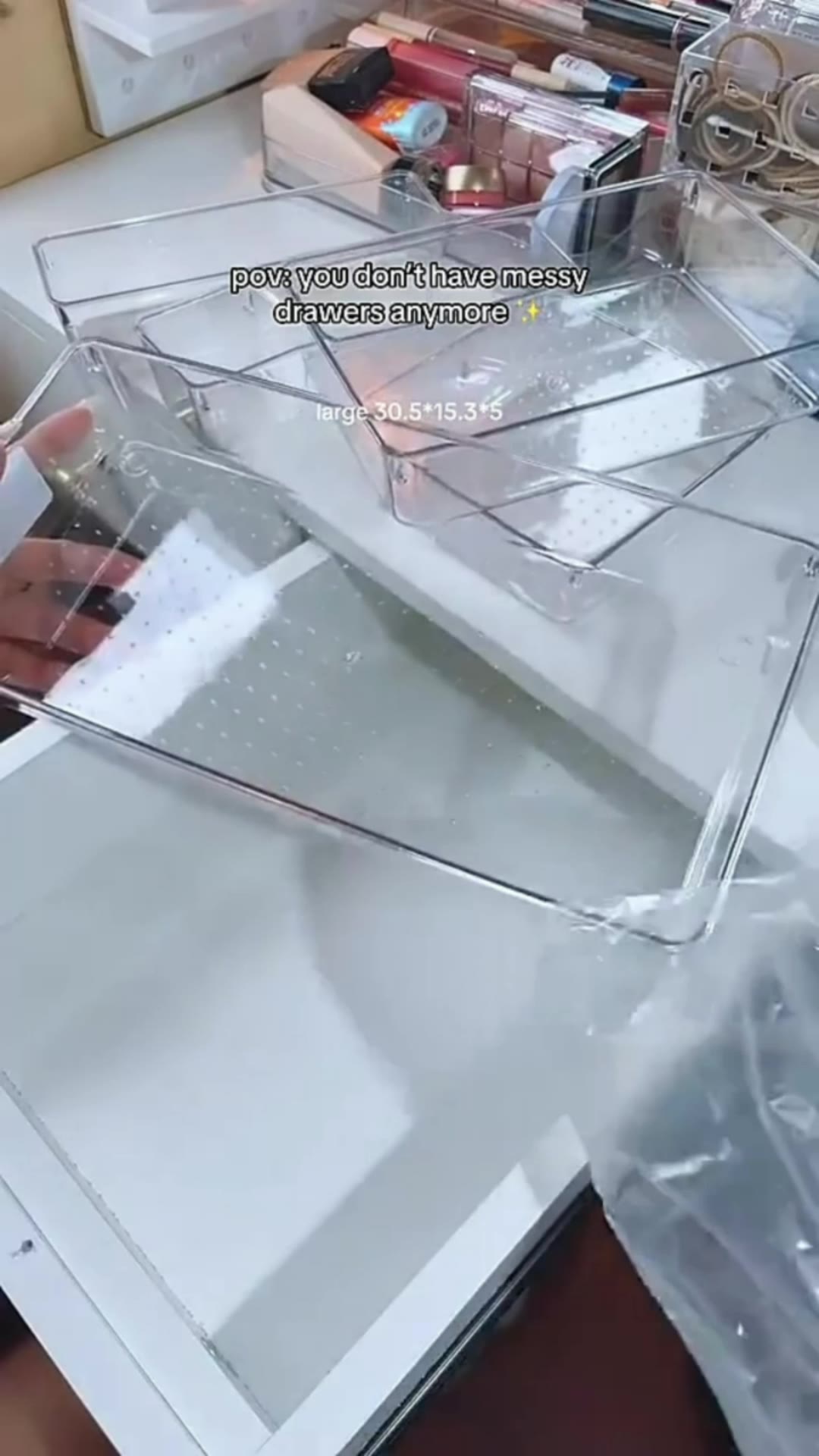 Transform your messy drawers into a tidy space with this sleek acrylic organizer. #drawerorganizer #homeorganization #makeupstorage #acrylicorganizer #vanitysetup #tidyhome #deskorganization